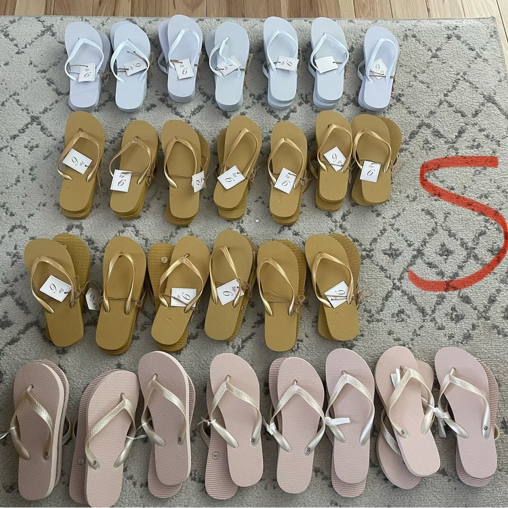 28 Flip Flops in White, Gold, and Pink